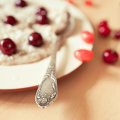 Oatmeal porridge closeup. Focus on spoon. 