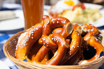 Basket with fresh bavarian pretzels with salt