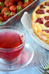 Homemade strawberry cake with fruit tea