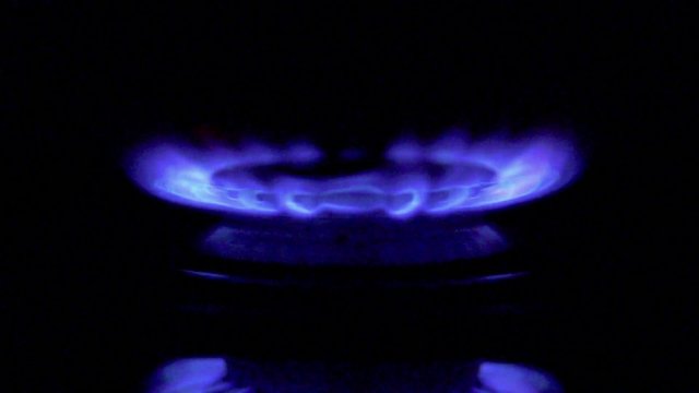 gas burning from a kitchen gas stove in slow motion. High speed 250fps.