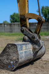 Construction site with equipment, machines,tools and construction workers
