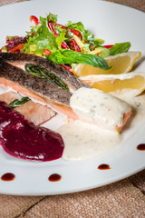 Fried salmon stuffed with spinach