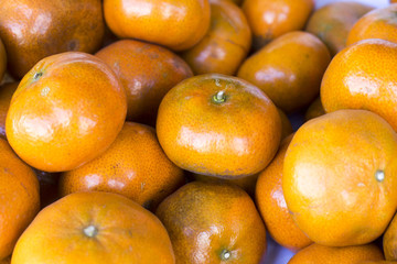 Lot of mandarin orange /Mandarin in a market in Peru