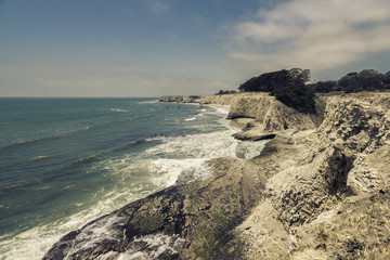 Empty Beach with steep cliffs