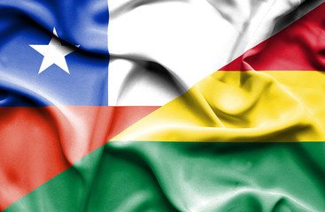 Waving flag of Bolivia and Chile