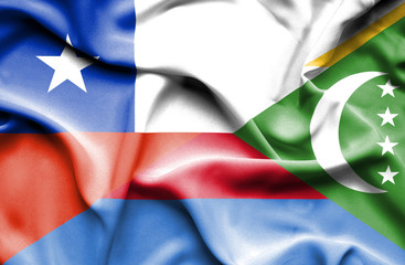 Waving flag of Comoros and Chile