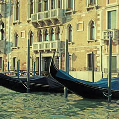 Fototapeta na wymiar Old houses entrance on Grand Canal in Venice, Italy