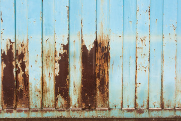 Old rusty galvanized fence slide door  placed vertically