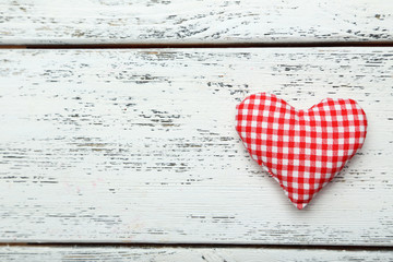 Love hearts on white wooden background