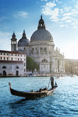 Fototapeta na wymiar Gondola and Basilica Santa Maria della Salute, Venice, Italy