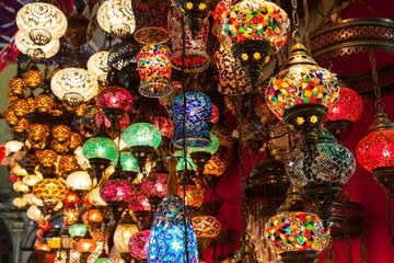 Fototapeta na wymiar Multi-colored lamps hanging at the Grand Bazaar in Istanbul.