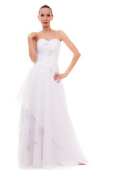 Fototapeta na wymiar Full length bride in white wedding gown isolated