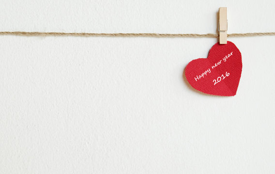 Red fabric heart with happy new year 2016 word