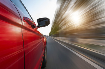 Obraz na płótnie Canvas car on the road wiht motion blur background.