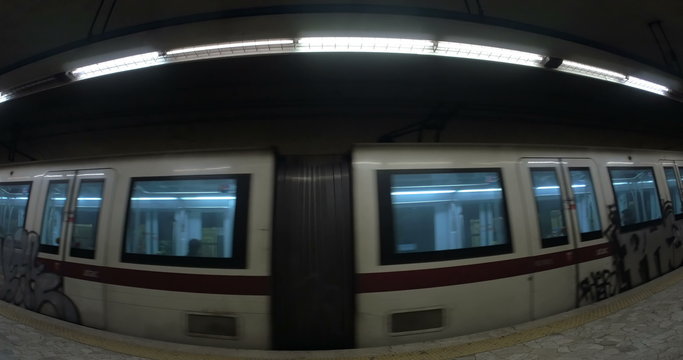 Two trains leaving underground station 