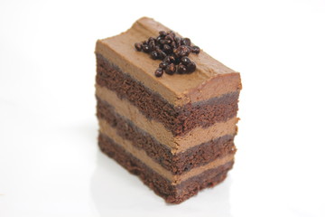 Chocolate sponge cakes on white plate.