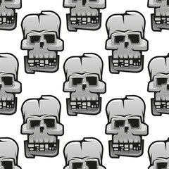 Eerie cracked skulls seamless pattern