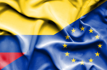 Waving flag of European Union and Columbia