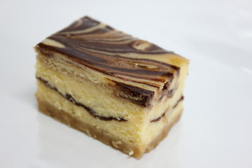 chocolate cheesecake with  on a white background.