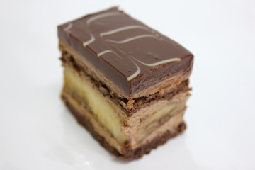  Chocolate sponge cakes on white plate.