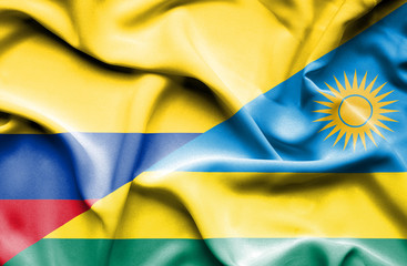 Waving flag of Rwanda and Columbia