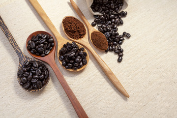 Coffee in wooden spoon background horizontal style