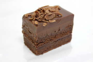  Chocolate sponge cakes on white plate.