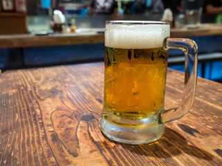 Beer in glass on table