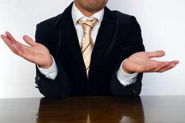 分からないジェスチャーのビジネスマン Businessman gesturing “I do not...