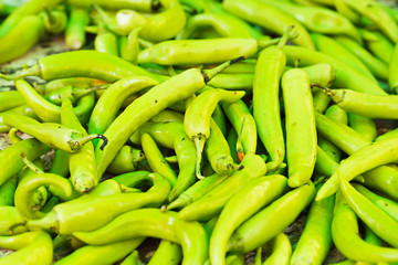 Fresh Green Hot Chillies in Marketplace for Background Uses.
