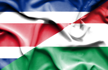Waving flag of Hungary and Costa Rica