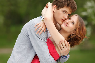 Young couple having fun in the park