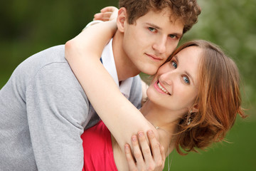 Fototapeta premium Young couple having fun in the park