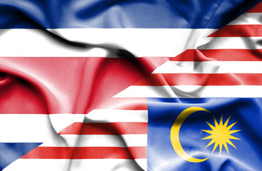 Waving flag of Malaysia and Costa Rica