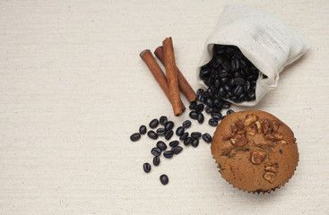 Coffee raisin muffin with coffee beans 