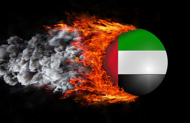 Flag with a trail of fire and smoke - United Arab Emirates