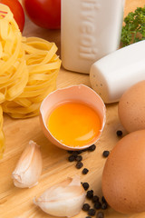 Italian food ingredients on wooden table
