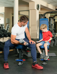 man and son in the gym