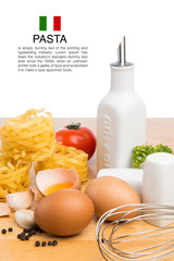 Still life with traditional italian pasta and ingredients on wooden table isolated on white,clipping path