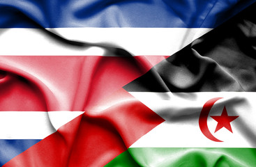Waving flag of Western Sahara and Costa Rica