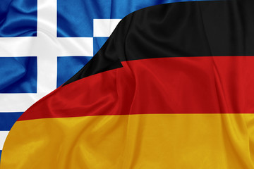 Germany and Greece flags on silk texture