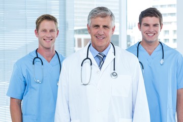 Team of doctors smiling at camera