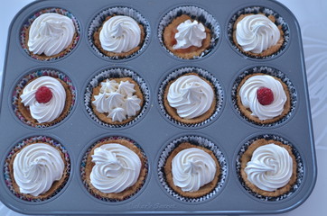 Different cupcakes in a baking pan