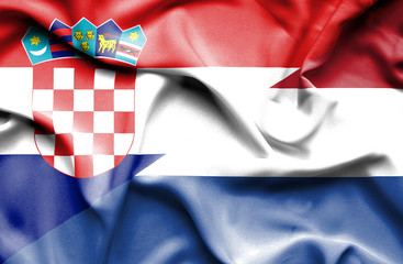 Waving flag of Netherlands and Croatia