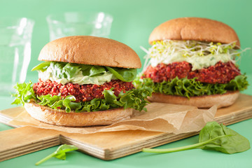 vegan beet and quinoa burger with avocado dressing