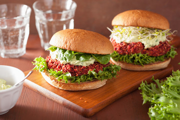 vegan beet and quinoa burger with avocado dressing