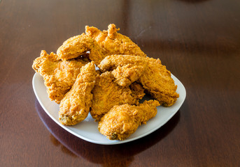 Square Plate of Fried Chicken on Wood Table