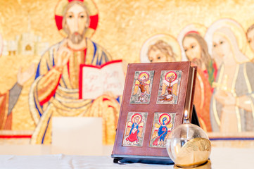 The book of Gospels, Bible, on the altar