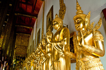 Golden buddha statue in buddhism temple thailand 