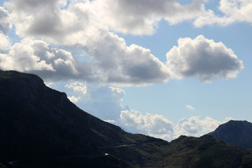 Mountains on a background of the sky and clouds